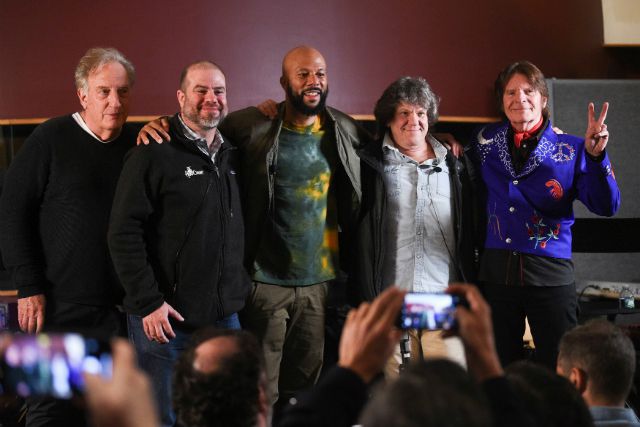 Comedy writer Alan Zweibel, HeadCount executive Andy Bernstein, rapper Common, Woodstock 50 organizer Michael Lang, and CCR frontman John Fogerty announcing Woodstock 50 lineup on Tuesday